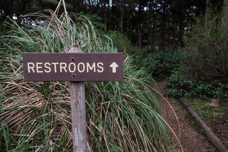 Restrooms-Sign-with-Arrow-cm