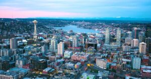 Seattle-Panoramic-South-Lake-Union-Buildings-Under-Construction-Center-Growing-City-Sunset-Red-Clouds-Aerial-Looking-North-cm