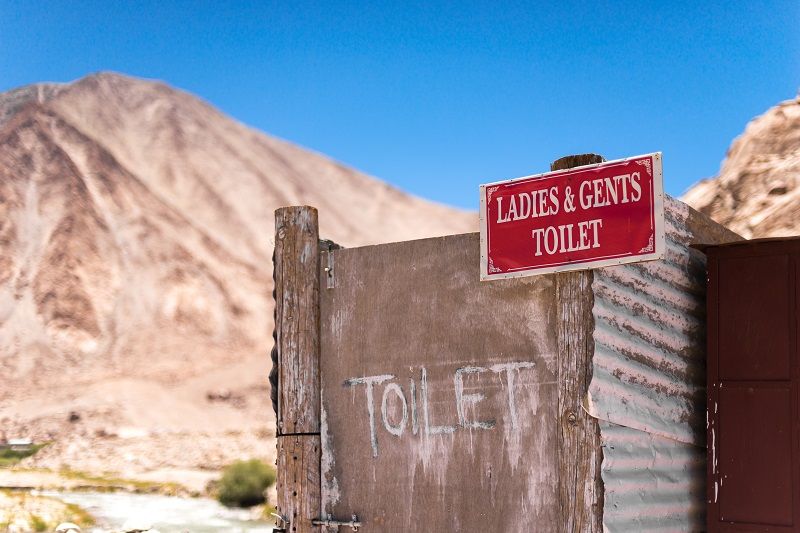 Public toilet in desert