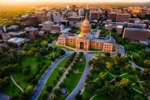 Capitol-building,-aerial-skyline,-sunset,-Austin,-TX,-Texas-State-Capital-cm