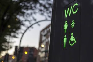 light sign in public toilet at sunset -cm